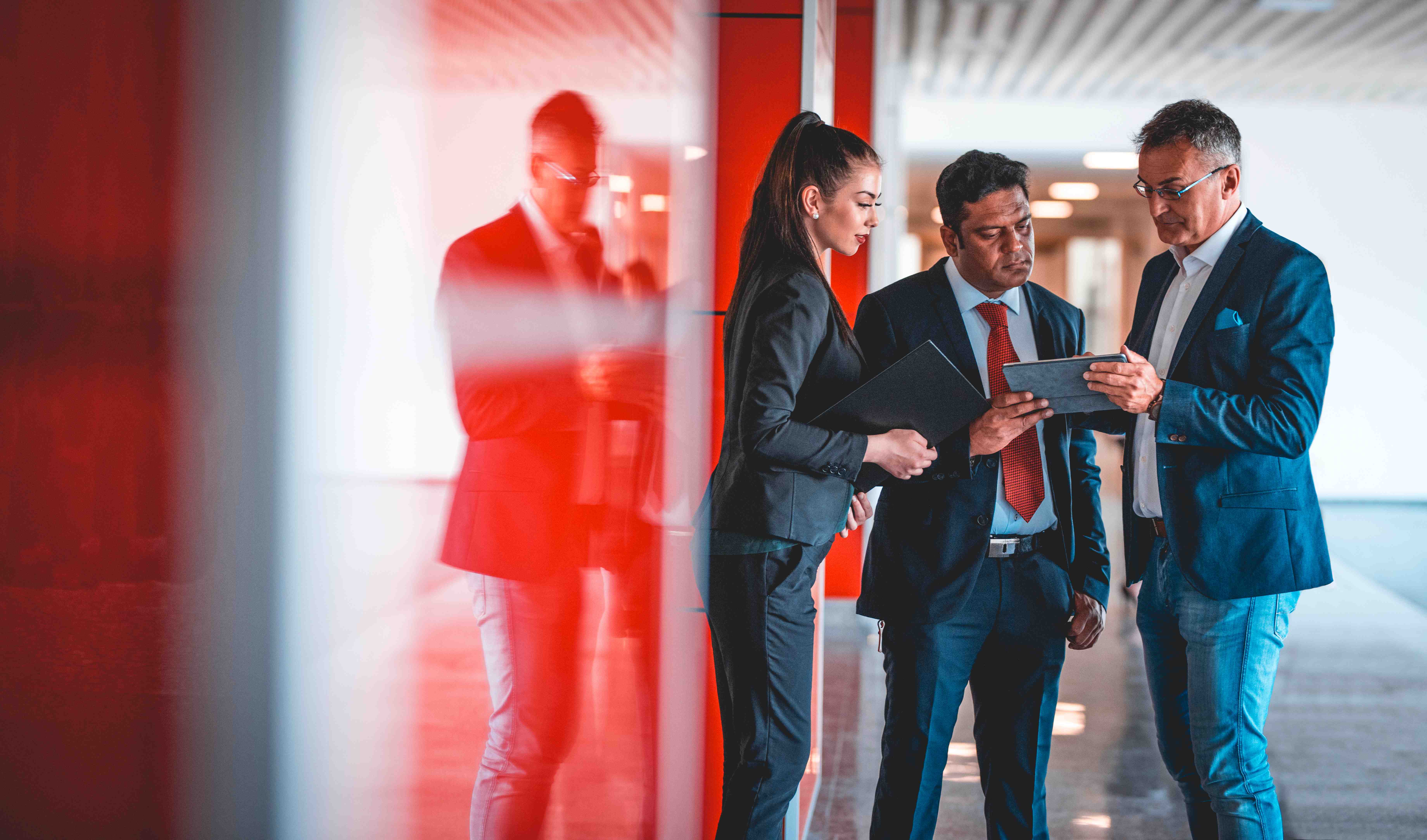 Business team with red lighting