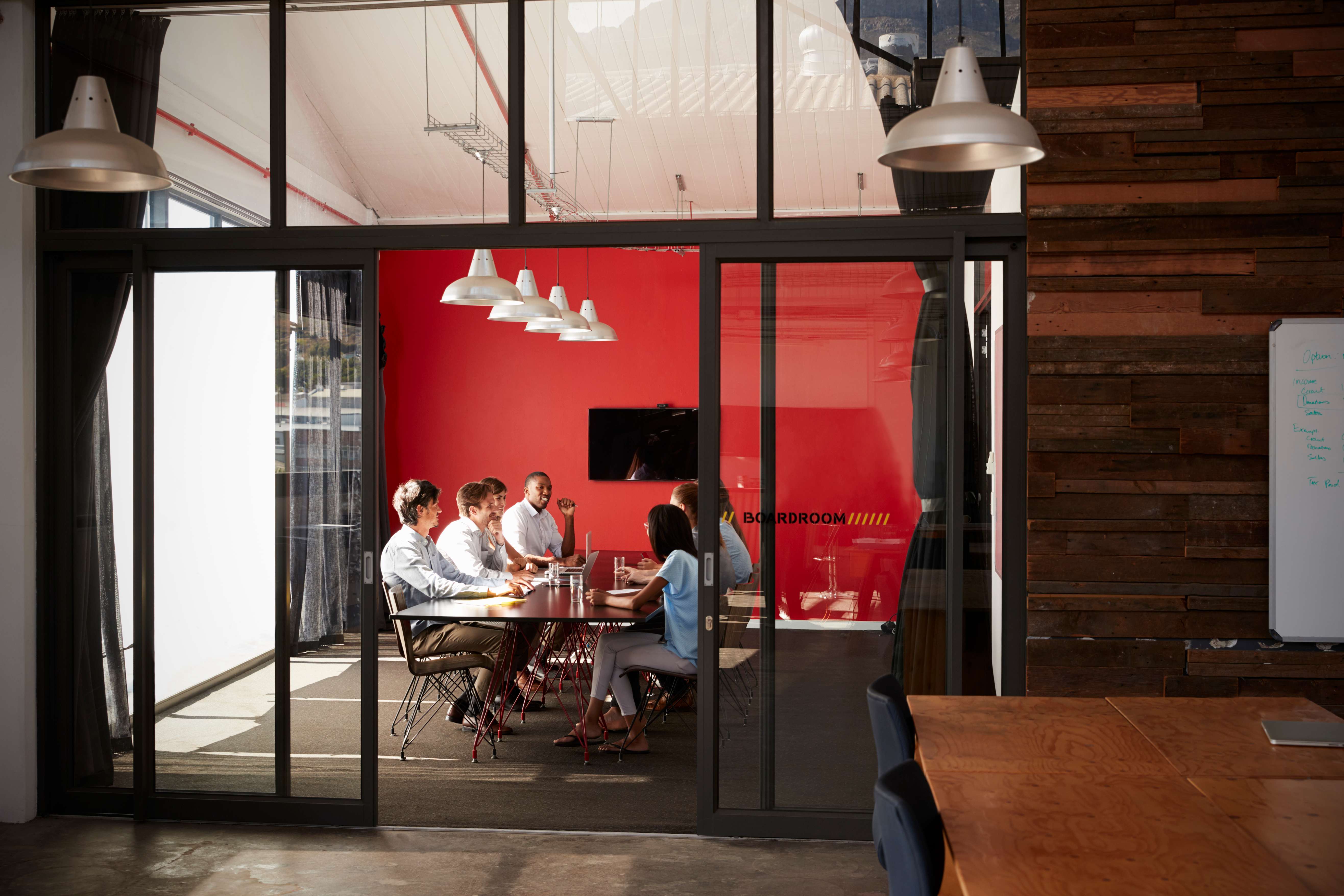 Leadership team collaborating in modern conference room